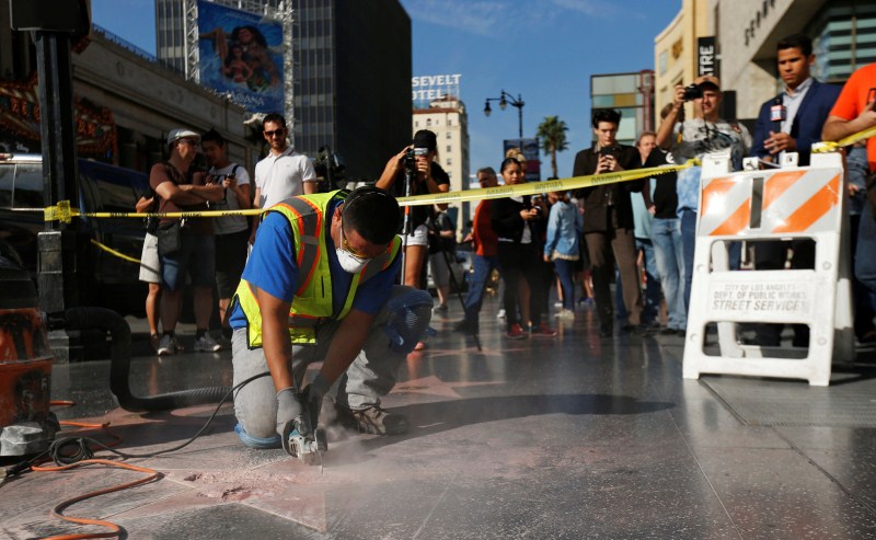 Donald Trump's star on the Hollywood Walk of Fame is fixed. The Republican presidential nominee, real estate developer and reality TV star has faced several large protests during his campaign appearances in California, where polls show him far behind Democratic presidential nominee Hillary Clinton. Donald Trump,Trump's Hollywood star vandalized,Hollywood Walk of Fame,Donald Trump star vandalized,sledgehammer,Hillary Clinton