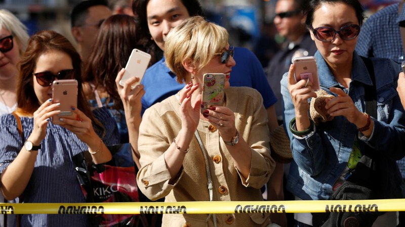 People take photos by Donald Trump's star on the Hollywood Walk of Fame as it is being fixed. Donald Trump,Trump's Hollywood star vandalized,Hollywood Walk of Fame,Donald Trump star vandalized,sledgehammer,Hillary Clinton