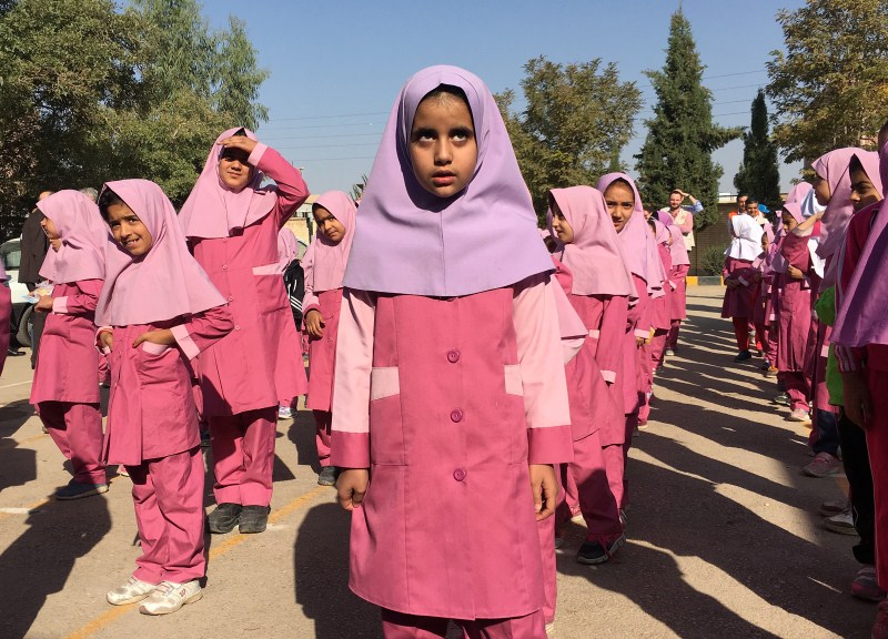 Iranian and Afghan girls gather at the Emam Hasan Mojtaba school in Kerman, Iran. Afghan refugees,Afghan refugees in Iran,Soviet invasion,Taliban insurgency,Islamic State attacks,Islamic attacks,Afghans,Taliban,refugees,refugees in Iran,Islamic refugees attacks