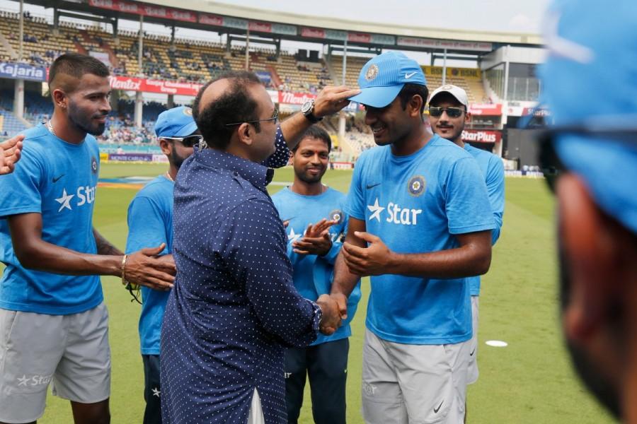 Proud moment for Jayant Yadav as he receives his ODI cap from batting great Virender Sehwag. India vs New Zealand,India vs New Zealand 5th ODI,India win toss,India vs New Zealand 5th ODI pics,India vs New Zealand 5th ODI images,India vs New Zealand 5th ODI photos,India vs New Zealand 5th ODI stills,India vs New Zealand 5th ODI pictures