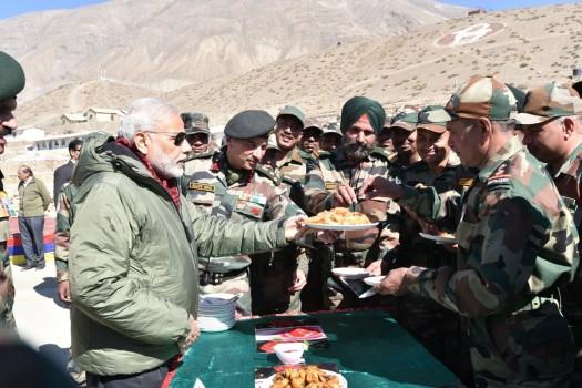 Photos of Prime Minister Narendra Modi interacts with soldiers in a remote and strategic area in Himachal Pradesh, adjoining the Chinese border on Oct 30, 2016.