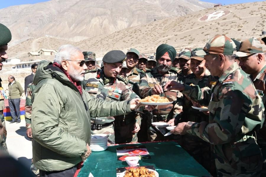 Photos of Prime Minister Narendra Modi interacts with soldiers in a remote and strategic area in Himachal Pradesh, adjoining the Chinese border on Oct 30, 2016. PM Modi,Narendra Modi,Narendra Modi celebrates Diwali,Narendra Modi celebrates Diwali with Indian Army,Narendra Modi with Indian Army,Himachal Pradesh