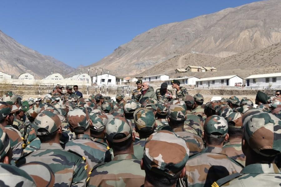 Photos of Prime Minister Narendra Modi interacts with soldiers in a remote and strategic area in Himachal Pradesh, adjoining the Chinese border on Oct 30, 2016. PM Modi,Narendra Modi,Narendra Modi celebrates Diwali,Narendra Modi celebrates Diwali with Indian Army,Narendra Modi with Indian Army,Himachal Pradesh
