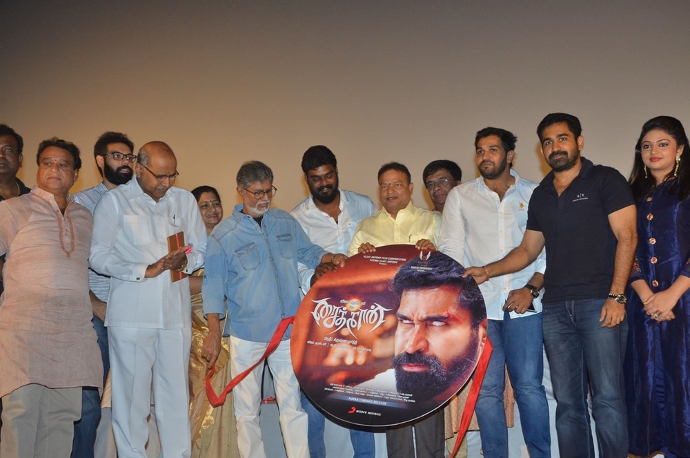 Tamil movie Saithan Audio Launch held at Chennai. Celebs like Vijay Antony, Arundhathi Nair, SA Chandrasekar, Shoba Chandrasekhar, Kitty, Pradeep Krishnamoorthy, Fathima Vijay Antony, YG Mahendran, GNR Kumaravelan, Ishari K Ganesh, Sudha Mahendra, SR Prabhu, Meera Krishnan, Shibu Thameen, Katrakatta Prasad and others graced the event. Saithan Audio Launch,Saithan Audio,Saithan,Vijay Antony,Arundhathi Nair,SA Chandrasekar,Saithan Audio Launch pics,Saithan Audio Launch images,Saithan Audio Launch photos,Saithan Audio Launch stills,Saithan Audio Launch pictures