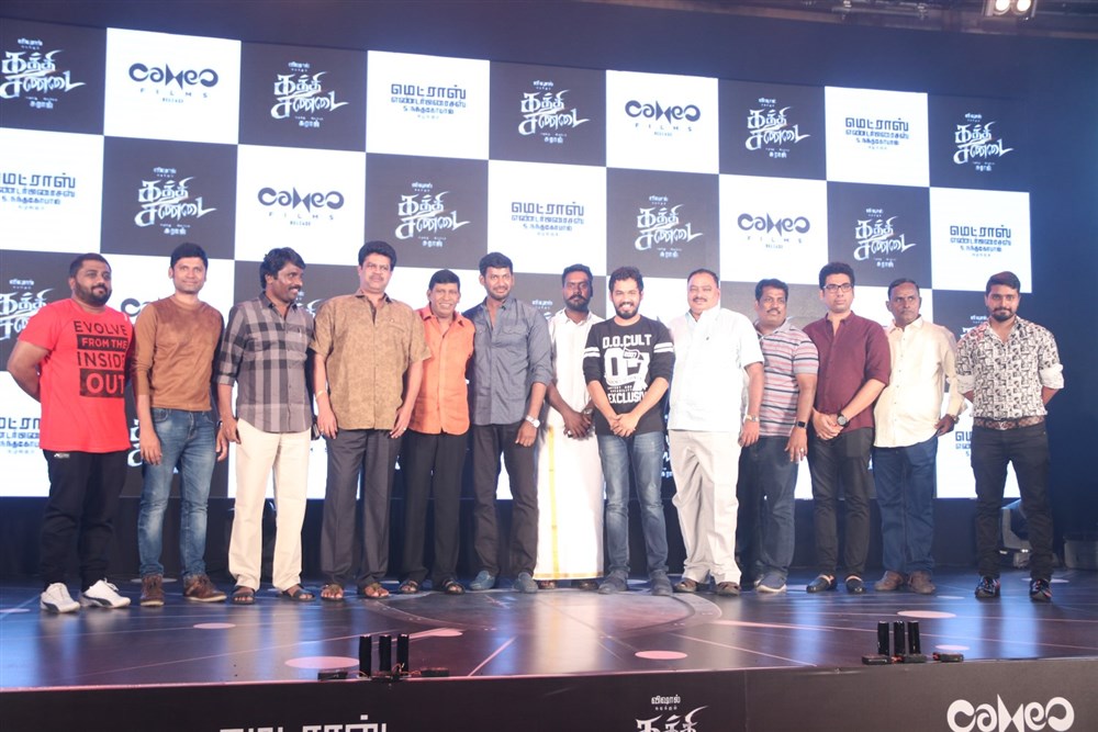 Tamil movie Kaththi Sandai Audio and Trailer Launch event held at Chennai. Celebs like Vishal, Vadivelu, Hiphop Tamizha Aadhi, Suraj, Richard M. Nathan, S. Nanthagopal, Aarthi, Selva RK, Ganesh and others graced the event. Kaththi Sandai,Kaththi Sandai Trailer,Kaththi Sandai Trailer launch,Kaththi Sandai audio launch,Kaththi Sandai music,Vishal,Vadivelu,Hiphop Tamizha Aadhi,Suraj,Richard M. Nathan,S. Nanthagopal,Aarthi,Selva RK,Kaththi Sandai Trailer Launch pics,Kaththi San