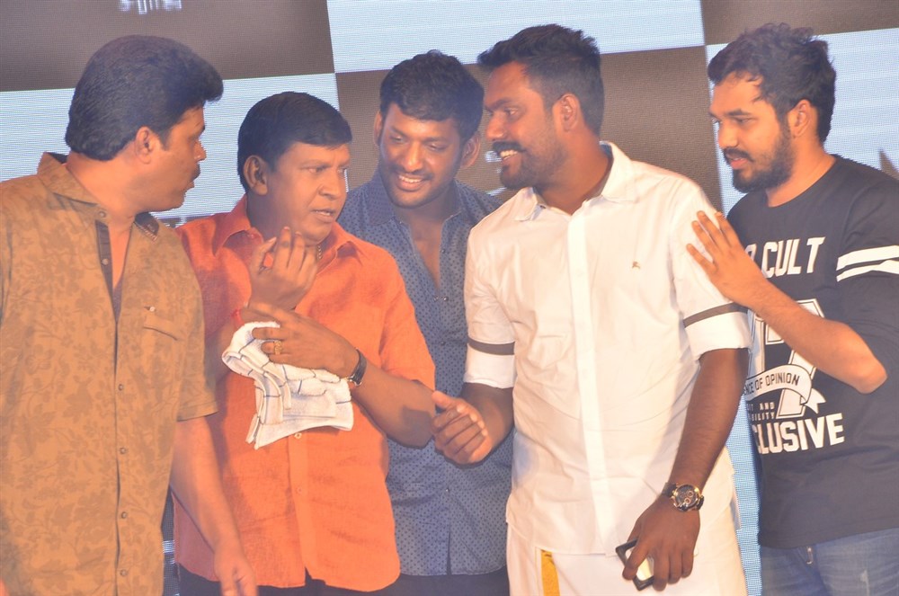 Tamil movie Kaththi Sandai Audio and Trailer Launch event held at Chennai. Celebs like Vishal, Vadivelu, Hiphop Tamizha Aadhi, Suraj, Richard M. Nathan, S. Nanthagopal, Aarthi, Selva RK, Ganesh and others graced the event. Kaththi Sandai,Kaththi Sandai Trailer,Kaththi Sandai Trailer launch,Kaththi Sandai audio launch,Kaththi Sandai music,Vishal,Vadivelu,Hiphop Tamizha Aadhi,Suraj,Richard M. Nathan,S. Nanthagopal,Aarthi,Selva RK,Kaththi Sandai Trailer Launch pics,Kaththi San