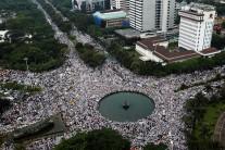 An aerial view shows members of hardline Muslim groups attending a protest against Jakarta's incumbent governor. The protesters, led by a group called the Islamic Defenders Front, chanted "God is greatest" and waved placards calling for Purnama, popularly known as Ahok, to be jailed for blasphemy.