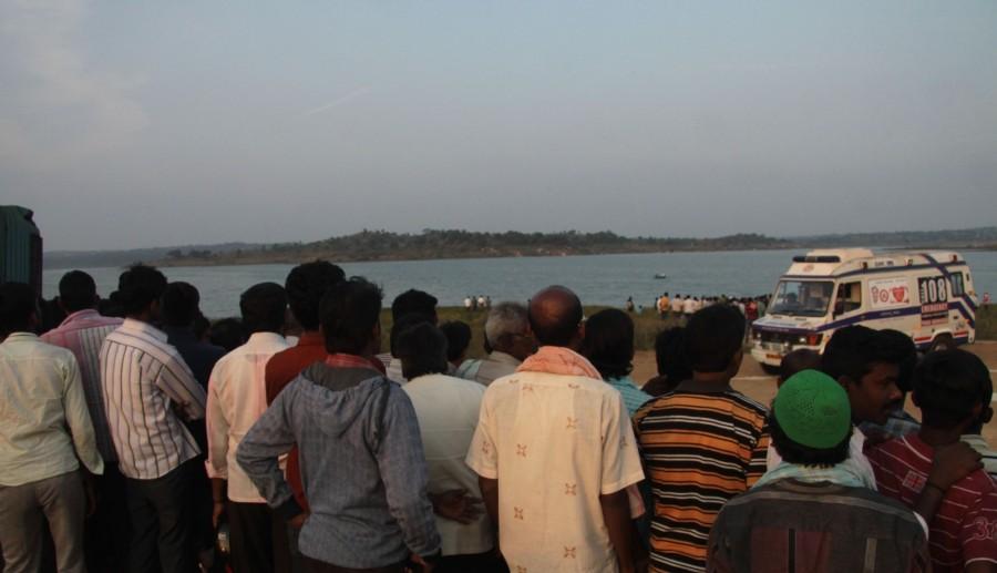 Rescue operations underway at TG Halli lake where two male actors Anil and Uday, aged 31 and 38 years drowned during the shooting of a Kannada movie while enacting a stunt scene by jumping from a helicopter. Masti Gudi accident,Masti Gudi,Masti Gudi kannada actors,Masti Gudi shooting,Rescue operations at Thippagondanahalli lake,Thippagondanahalli lake,Thippagondanahalli,TG Halli,Duniya Vijay,Duniya Vijay at Masti Gudi accident