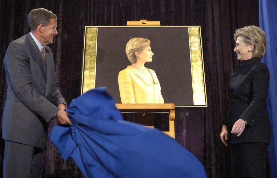Former first lady Sen. Hillary Clinton (D-NY), R, looks on as Secretary of the Smithsonian Lawrence Small (L) unveils a portrait of her in Washington, April 24, 2006. New portraits of the Clintons will hang in the restored National Portrait Gallery, which is scheduled to open July 1. 2006. Hillary Clinton,Hillary Clinton rare pics,Hillary Clinton rare images,Hillary Clinton rare photos,Hillary Clinton rare stills,Hillary Clinton rare pictures,Hillary Clinton unseen pics,Hillary Clinton unseen images,Hillary Clinton unseen photos,Hillary Cli