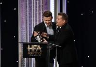 Actor James Corden congratulates musician Justin Timberlake (L) as he accepts the Hollywood Song Award for "Can't Stop this Feeling" from the "Trolls" soundtrack at the Hollywood Film Awards in Beverly Hills, California, U.S., November 6, 2016.