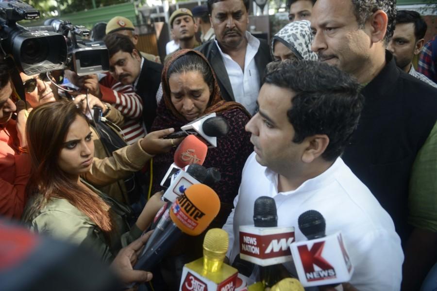 Missing JNU student Najeeb's mother Fatima Nafees with Samajwadi Party MP Dharmendra Yadav coming out after meeting Union Home Minister Rajnath Singh at his residence in New Delhi on Nov. 8, 2016. Rajnath Singh,JNU student Najeeb,Najeeb,Najeeb mother,Union Home Minister Rajnath Singh,Fatima Nafees