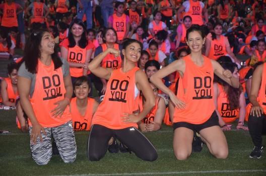 Indian wrestler Sakshi Malik, actors Jacqueline Fernandez and Kalki Koechlin perform in the making of a Guinness world record of the most number of women to hold the abdominal plank position for 60 seconds in Mumbai on Nov 6, 2016.