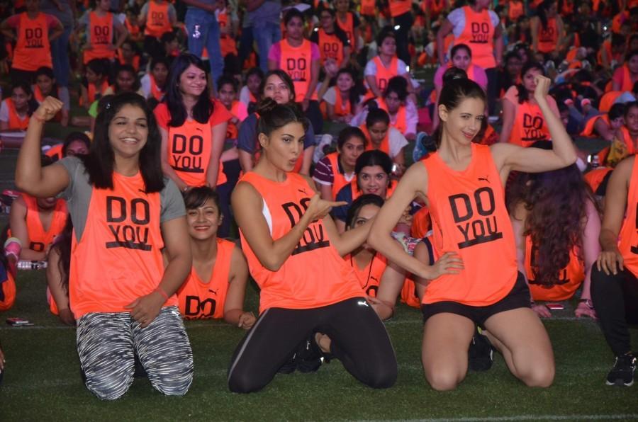 Indian wrestler Sakshi Malik, actors Jacqueline Fernandez and Kalki Koechlin perform in the making of a Guinness world record of the most number of women to hold the abdominal plank position for 60 seconds in Mumbai on Nov 6, 2016. Sakshi Malik,Jacqueline Fernandez,Kalki Koechlin,abdominal plank position,abdominal plank,abdominal plank position for 60 seconds,Guinness world record