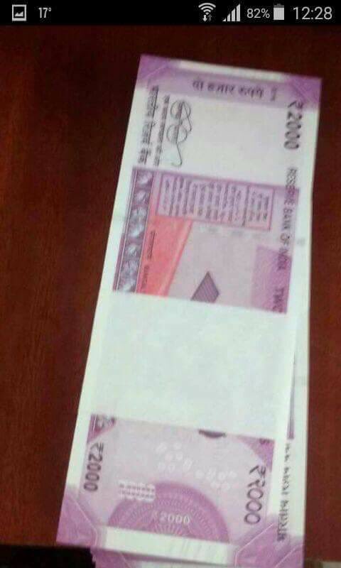 Images of new 500 and 2000 currency note go viral. 500,500 rs note,New 500 rs note,New 500 rs note in India,2000 rs,Rs 2000,2000 rs note,new Rs 2000 picture,new Rs 2000 note photo,How Rs 2000 note looks,Rs 2000 note image,RS 2000 currency note