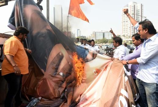 Shivsena activists burn the poster of upcoming film 