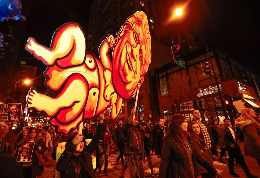 Protesters walk during a protest against Republican president-elect Donald Trump in Chicago, Illinois, U.S. Donald Trump,Donald Trump as 45th US President,45th US President,US President,America divided after the Election,People react after the results,America divided after election