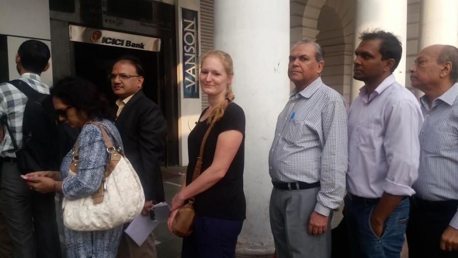 Though there was no limit on deposit, for big amounts the banks were insisting on PAN number. Those drawing Rs 10,000 from their bank accounts were also asked to produce their identity proof. Rs 500, Rs 1000 exchange,Note exchange,Long queues seen outside banks,Long queues seen outside ATMs,Rs 500 and Rs 1,000,currency notes
