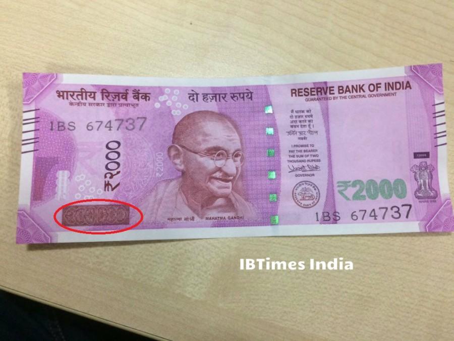 2. Latent image with denominational numeral 2000 which can be seen when the banknote is held at 45 degress angle at tht eye level. Society,PM Modi,Rs 2000,Photos of rs 2000 notes,New rs 2000 note,Feature,Security,Fake,Corruption,Black money,Currency,Note,Detail,You wanted to know,Reserve Bank of India,RBI