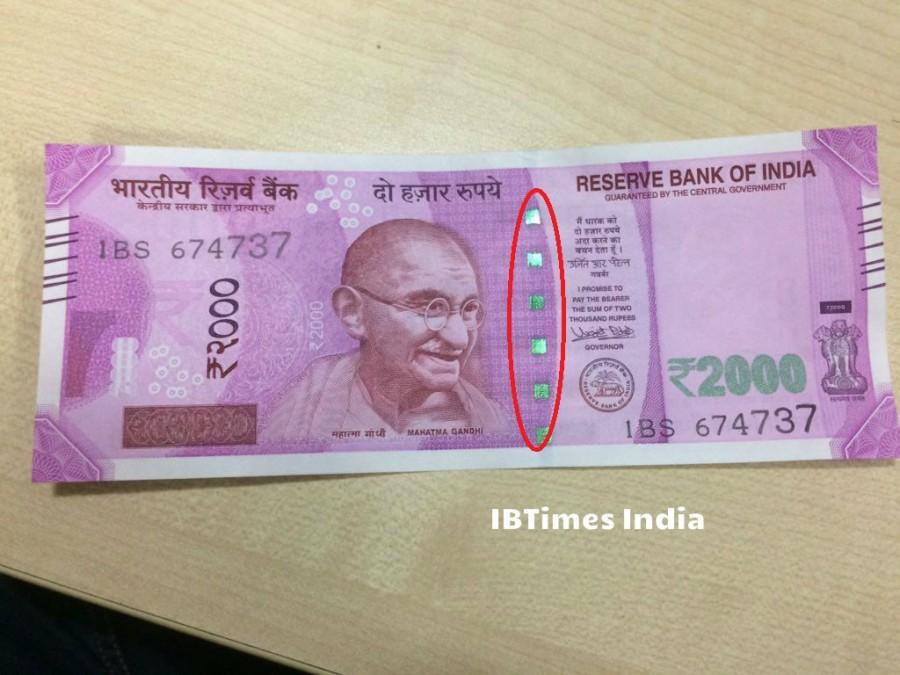 6. Colour shift windowed security thread with inscriptions ‘भारत’, RBI and 2000. Colour of the thread changes from green to blue when the note is tilted. Society,PM Modi,Rs 2000,Photos of rs 2000 notes,New rs 2000 note,Feature,Security,Fake,Corruption,Black money,Currency,Note,Detail,You wanted to know,Reserve Bank of India,RBI