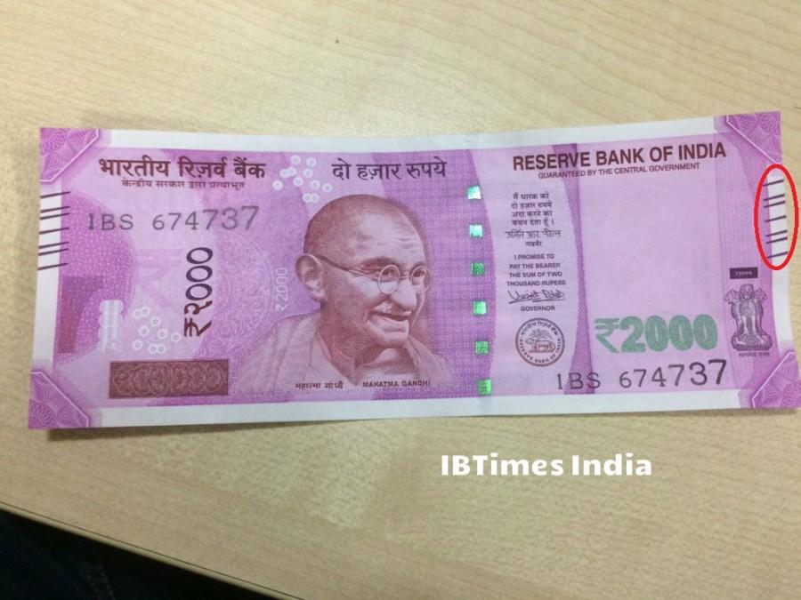 13. Seven angular bleed lines on left and right side in raised print. Society,PM Modi,Rs 2000,Photos of rs 2000 notes,New rs 2000 note,Feature,Security,Fake,Corruption,Black money,Currency,Note,Detail,You wanted to know,Reserve Bank of India,RBI