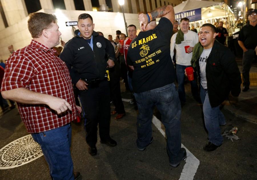 Demonstrators argue with United States Marines while protesting against the election of Donald Trump in New Orleans, Louisiana. Anti-Trump protests,Trump protests,Donald Trump,Donald Trump protest,presidential election victory