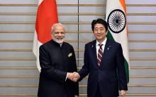 Indian Prime Minister Narendra Modi (L) is shakes hands with Japan's Prime Minister Shinzo Abe at the start of their meeting at Abe's official residence in Tokyo, Japan November 11, 2016.
