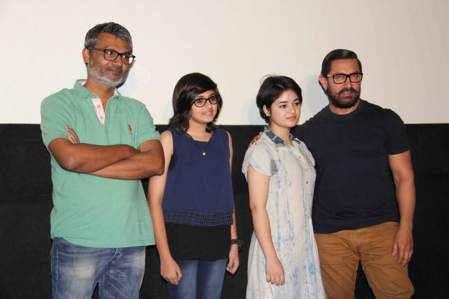 The song is dedicated to Aamir by his daughters Geeta and Babita, who find their father 'Haanikaarak' or injurious to health. The song successfully highlights the hard work Geeta and Babita undergo before their father introduces them to the 'Akhara'. Aamir Khan,Dangal,Dangal first song,Dangal first song launch,Dangal first song launch pics,Dangal first song launch images,Dangal first song launch photos,Dangal first song launch stills,Dangal first song launch pictures