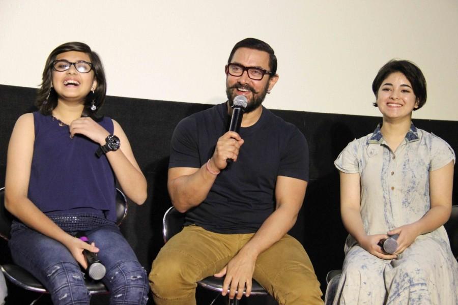 The song's quirky lyrics, written by Amitabh Bhattacharya and it's desi music composed by Pritam, has struck an instant chord with the audience. Zaira and Suhani shared their experiences of working with Aamir, terming Aamir to be supportive and caring as opposed to being a 'Haanikaarak Bapu' onscreen. Aamir Khan,Dangal,Dangal first song,Dangal first song launch,Dangal first song launch pics,Dangal first song launch images,Dangal first song launch photos,Dangal first song launch stills,Dangal first song launch pictures