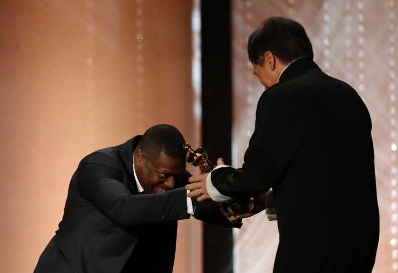 Actor Chris Tucker present Jackie Chan (R) with his Honorary Award at the 8th Annual Governors Awards in Los Angeles, California, U.S., November 12, 2016. Jackie Chan,Jackie Chan wins Oscar,Jackie Chan with Oscar,actor Jackie Chan,Jackie Chan Oscar,Jackie Chan at 8th Annual Governors Awards,8th Annual Governors Awards,8th Annual Governors Awards 2016