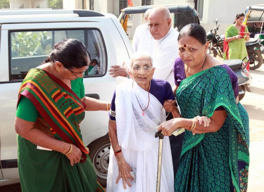 Prime Minister Narendra Modi's mother Heerabaa Modi on Tuesday exchanged demonetised currency for Rs 4,500 at a bank in Gandhinagar in Gujarat. Narendra Modi,Narendra Modi mother,Narendra Modi mother Heeraben Modi,Heeraben Modi,Heeraben Modi visits bank,exchange currency