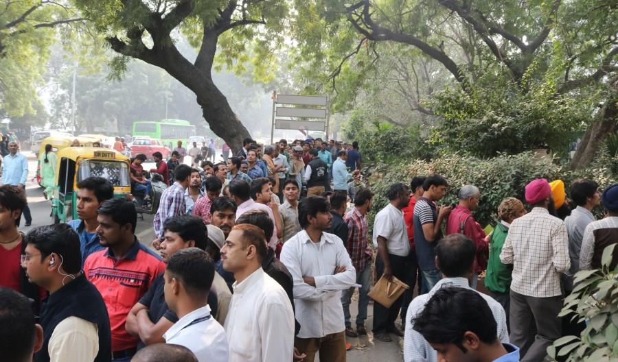 People are turning restless, as their wait in the serpentine queues to deposit, exchange or withdraw money from banks and ATMs since the scrapping of high-value currency notes is turning out to be really long. ATM kiosks,People queue,People queue outside ATM,India queue up outside banks,Demonetisation,No end to long queues,Cash crunch