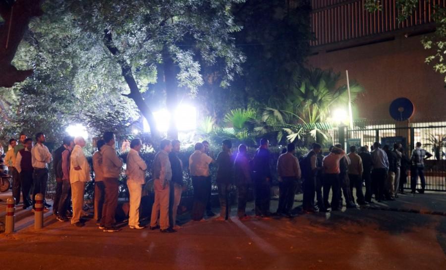 People are turning restless, as their wait in the serpentine queues to deposit, exchange or withdraw money from banks and ATMs since the scrapping of high-value currency notes is turning out to be really long. ATM kiosks,People queue,People queue outside ATM,India queue up outside banks,Demonetisation,No end to long queues,Cash crunch