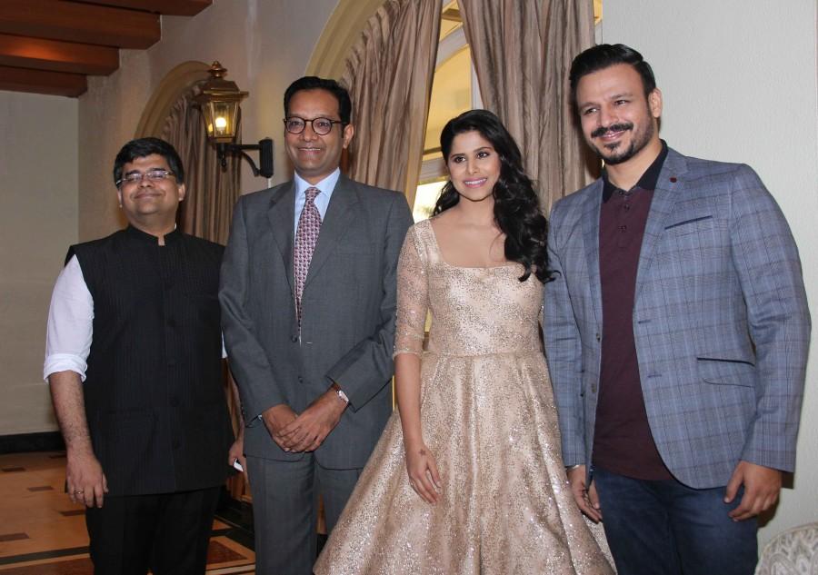 Photos of Bollywood actors Vivek Oberoi, Sai Tamhankar and Anuj Poddar, Business Head, Viacom 18 Media Private Limited during the press conference of Filmfare Awards Marathi in Mumbai on Nov 16, 2016. Vivek Oberoi,Sai Tamhankar,Anuj Poddar,Filmfare Awards,Marathi Filmfare Awards,Filmfare Awards Marathi,Press conference of Filmfare Awards Marathi,Press conference of Filmfare Awards