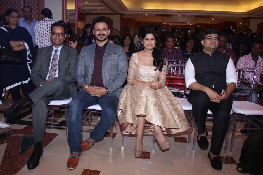 Photos of Bollywood actors Vivek Oberoi, Sai Tamhankar and Anuj Poddar, Business Head, Viacom 18 Media Private Limited during the press conference of Filmfare Awards Marathi in Mumbai on Nov 16, 2016. Vivek Oberoi,Sai Tamhankar,Anuj Poddar,Filmfare Awards,Marathi Filmfare Awards,Filmfare Awards Marathi,Press conference of Filmfare Awards Marathi,Press conference of Filmfare Awards