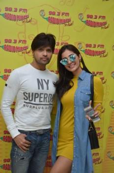 Photos of Himesh Reshammiya and Alankrita Sahai at Mirchi 98.3 studio.