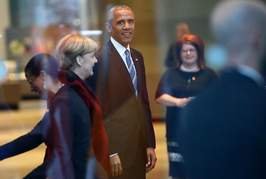 President Barack Obama looks on next to German Chancellor Angela Merkel upon his arrival at the chancellery in Berlin, Germany. Barack Obama,President Barack Obama,Obama last tour of Europe,Obama in Europe,Donald Trump,Barack Obama's last tour of Europe
