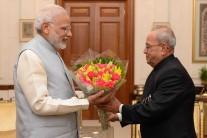 Photos of Prime Minister Narendra Modi calls on President Pranab Mukherjee at Rashtrapati Bhavan in New Delhi on Nov. 18, 2016.