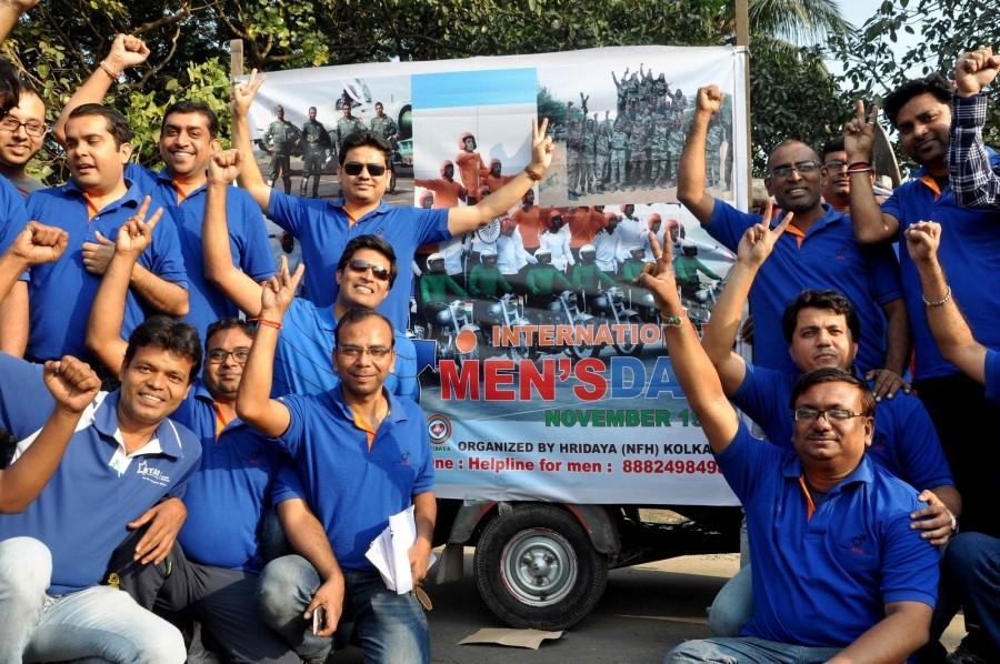 Photos of People participate in a car rally to commemorate International Men's Day in Kolkata on Nov 19, 2016. Car rally on International Men's Day,Car rally,International Men's Day,International Men's Day 2016