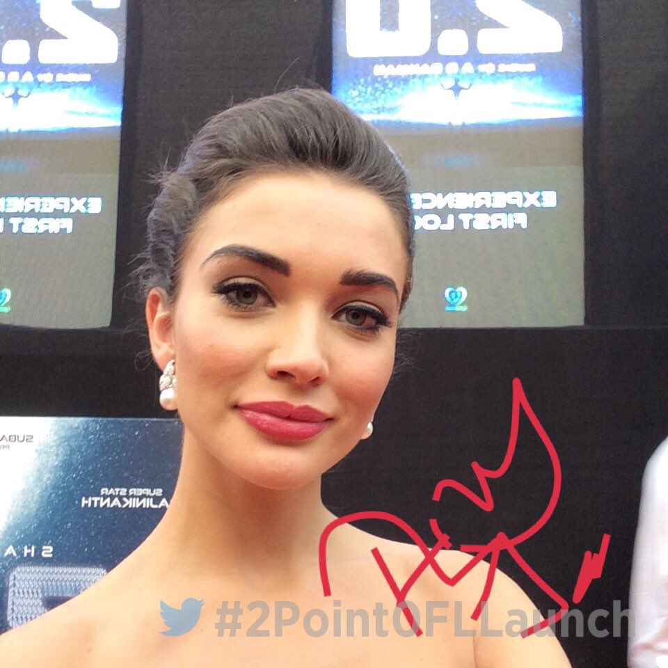 Amy Jackson at 2.0 first look launch. Amy Jackson,Director Shankar,Amy Jackson at 2.0 first look launch,Director Shankar at 2.0 first look launch,2.0 first look launch,2.0 first look launch event,2.0 first look poster,2.0 first look launch pics,2.0 first look launch images,2.0 first look laun