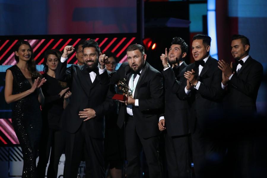 Banda El Recodo De Cruz Lizarraga accept the award for best banda album for "Raices". Latin Grammy Awards,Latin Grammy Awards 2016,Latin Grammy Awards pics,Latin Grammy Awards images,Latin Grammy Awards photos,Latin Grammy Awards stills,Latin Grammy Awards pictures