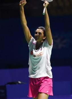 Pusarl Venkata Sindhu of India celebrates during the women's singles final against Sun Yu of China at the China Open badminton tournament in Fuzhou, capital of southeast China's Fujian Province, Nov. 20. Sindhu claimed the title with 2-1.