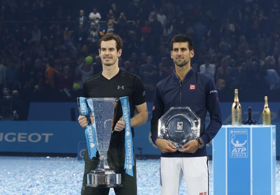 Britain's Andy Murray and Serbia's Novak Djokovic pose during the awarding ceremony for the men's singles at the 2016 ATP World Tour Finals at the O2 Arena in London, Britain on Nov. 20, 2016. Murray won 2-0 in the final. Andy Murray,Novak Djokovic,Andy Murray beats Novak Djokovic,Andy Murray wins ATP World Tour Finals,Andy Murray wins ATP World Tour,Andy Murray wins ATP World Tour title,ATP World Tour Finals,ATP World Tour Finals 2016,ATP World Tour,ATP World Tour pics,AT