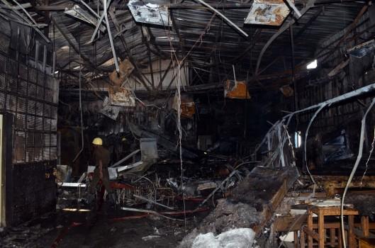 Photos of Fire fighters try to douse a fire that broke out at SSKM hospital in Kolkata on Nov 21, 2016.