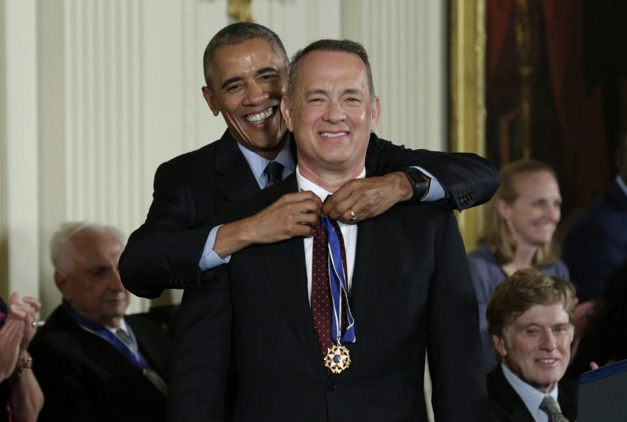 U.S. President Barack Obama presents the Presidential Medal of Freedom to actor Tom Hanks during a ceremony in the White House East Room in Washington, U.S., November 22, 2016. Medals of Freedom,Obama,Barack Obama,Robert de Niro,Diana Ross,Tom Hanks,Kareem Abdul-Jabbar,Presidential Medal of Freedom,Medals of Freedom pics,Medals of Freedom images,Medals of Freedom photos,Medals of Freedom stills,Medals of Freedom pictures