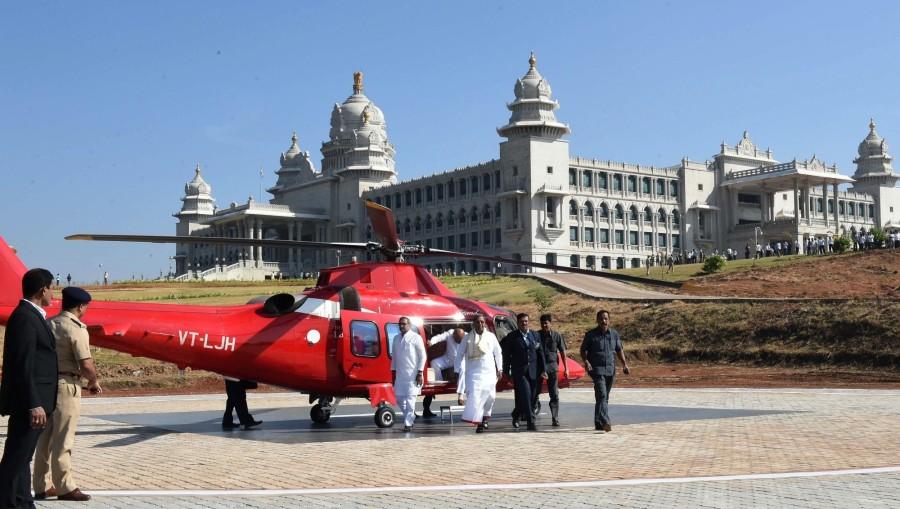 Photos of Karnataka Chief Minister Siddaramaiah arrives from a helicopter, after a new helipad constructed at Suvarna Soudha in Belagavi, for the winter session of the Karnataka Assembly on Nov 22, 2016. Siddaramaiah,CM Siddaramaiah,CM Siddaramaiah arrives at Suvarna Soudha by helicopter,Siddaramaiah arrives at Suvarna Soudha by helicopter,CM Siddaramaiah arrives at Suvarna Soudha