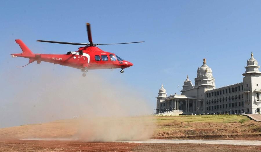 Photos of Karnataka Chief Minister Siddaramaiah arrives from a helicopter, after a new helipad constructed at Suvarna Soudha in Belagavi, for the winter session of the Karnataka Assembly on Nov 22, 2016. Siddaramaiah,CM Siddaramaiah,CM Siddaramaiah arrives at Suvarna Soudha by helicopter,Siddaramaiah arrives at Suvarna Soudha by helicopter,CM Siddaramaiah arrives at Suvarna Soudha