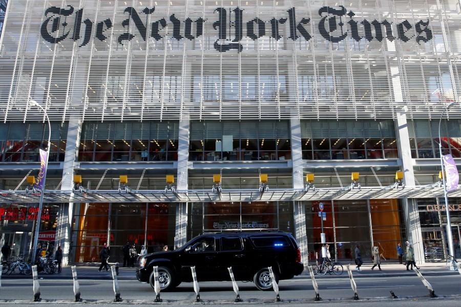 The motorcade of President-elect Donald Trump makes its way past the New York Times building after a meeting in New York, speaking on a wide range of issues with New York Times editors and reporters on Tuesday. Trump, who has an adversarial relationship with the newspaper, has not held a traditional news conference to talk about his priorities since his election on Nov. 8. Donald Trump,President-elect Donald Trump,Donald Trump meets New York Journalists,Donald Trump meets New York Journalists and executives,New York Journalists,New York Journalists and executives