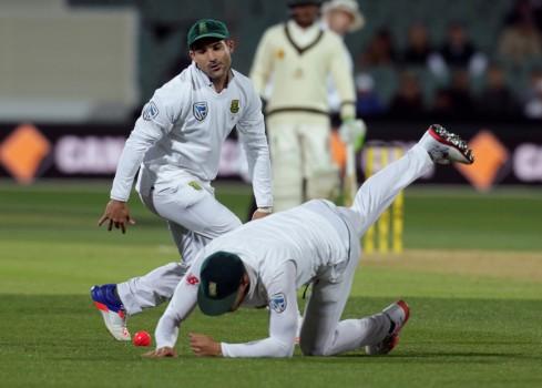 South Africa captain Faf du Plessis drops a catch opportunity off Australia's Matt Renshaw as Dean Elgar watches on during the first day of the Third Test cricket match in Adelaide.