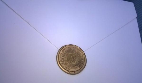 Photos of Yuvraj Singh and Hazel Keech's wedding invitation.