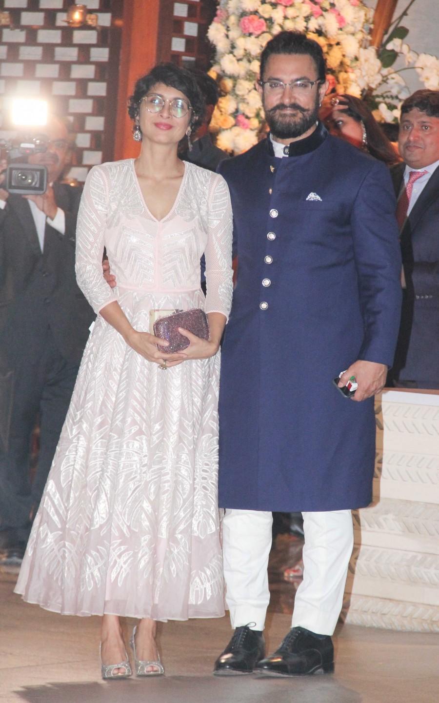 Photos of Bollywood actor Aamir Khan with his wife Kiran Rao at the pre-wedding bash of Ambani's niece Isheta. Amitabh Bachchan,Aamir Khan,Kiran Rao,Ambani,Ambani pre-wedding bash,celebs at Ambani pre-wedding bash,Ambani pre-wedding bash pics,Ambani pre-wedding bash images,Ambani pre-wedding bash photos,Aamir Khan and Kiran Rao